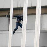 BERLIN, GERMANY - AUGUST 12: A stuntman dressed as Captian America jumps off a building while filming Captain America, Civil War on August 12, 2015 in Berlin, Germany. (Photo by Chad Buchanan/GC Images)